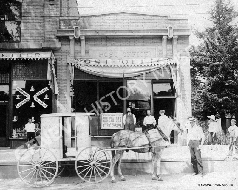 Product Description: Circa 1910 - Geneva Post Office with horse and buggy mail wagon at 221 West State Street; now occupied by Blinka Optical.</br></br>Available sizes:</br></br>8 x 10 = $20.00; 11 x 14 = $30.00; 16 x 20 = $40.00; 20 x 30 = $55.00; 24 x 36 = $65.00</br></br>In-store pickup free. Shipping available.</br> No. 14 - Geneva Post Office, Circa 1910